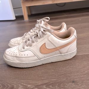 Pink and white Nikes